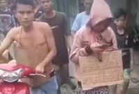 Kepergok Berzina, Dua Sejoli Diarak. Foto: Istimewa