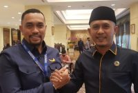 Ketua RG Peduli Kepri Erwan Bachrani bersama anggota DPR RI Ahmad Syahroni. Foto: Dok. Pribadi 