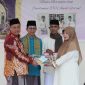 Wakil Wali Kota Batam Amsakar Achmad bersama pengurus Yayasan Asma Husnul Khatimah Belakangpadang. Foto: MC Batam 