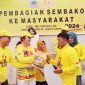 Cen Sui Lan Anggota DPR RI dari Partai Golkar Dapil Kepulauan Riau membagikan paket beras di tiga titik sekaligus di Kota Batam, Sabtu 1 April 2023. Foto: Tangkapan Layar. 