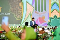 Presiden Jokowi saat menghadiri acara Hari Lahir ke-78 Muslimat Nahdlatul Ulama (NU) yang digelar di Stadion Utama Gelora Bung Karno, Jakarta, pada Sabtu (20/1/2024). Foto: BPMI Setpres.