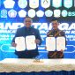 Dalam upaya memberikan perlindungan terhadap tenaga pekerja migran, pemerintah kota Tanjungpinang melakukan Penandatanganan Nota Kesepakatan dan Perjanjian Kerjasama dengan Badan Perlindungan Pekerja Migran Indonesia (BP2MI). Nota Kesepakatan tersebut ditandatangani langsung oleh oleh Pj Wali kota Tanjungpinang Hasan,S.Sos, bersama dengan Kepala BP2MI Benny Rhamdani. Acara tersebut dilaksanakan di Aula K.H. Abdurrahman Wahid Lantai 1 BP2MI pada Selasa (20/02/2024). Foto: Diskominfo Tanjungpinang