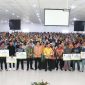 Peneyrahan bantuan kepada masyarakat di Kecamatan Batu Aji, Sekupang dan Belakang Padang di Aula Universitas Riau Kepulauan, Batu Aji, Kota Batam. Foto: Diskominfo Kepri