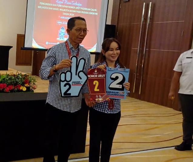 Amsakar Achmad-Li Claudia Chandra. Foto: INIKEPRI.COM