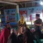 Cen Sui Lan-Jarmin Sidik di lapangan gasing Air Kolek, Kelurahan Ranai, Kecamatan Bunguran Timur, pada Selasa, 8 Oktober 2024. Foto: INIKEPRI.COM