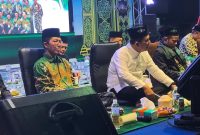 Calon Wali Kota Batam Amsakar Achmad dan Calon Gubernur Kepulauan Riau Ansar Ahmad menghadiri acara Batam Bersholawat dalam rangka penutupan Hari Safari Maulid 1446 Hijiriah dan Hari Santri Nasional yang jatuh pada tanggal 22 Oktober tiap tahunnya, yang diselenggarakan di Mall Botania 2, Batam Center, Kota Batam, Jumat 27 Oktober 2024. Foto: INIKEPRI.COM