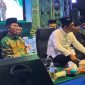 Calon Wali Kota Batam Amsakar Achmad dan Calon Gubernur Kepulauan Riau Ansar Ahmad menghadiri acara Batam Bersholawat dalam rangka penutupan Hari Safari Maulid 1446 Hijiriah dan Hari Santri Nasional yang jatuh pada tanggal 22 Oktober tiap tahunnya, yang diselenggarakan di Mall Botania 2, Batam Center, Kota Batam, Jumat 27 Oktober 2024. Foto: INIKEPRI.COM