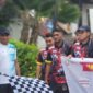 Pelepasan jalan santai dalam rangka menyemarakkan hari Bhakti ke-75 Imigrasi, di halaman Kantor Imigrasi Kelas II TPI Belakangpadang. Foto: INIKEPRI.COM