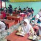 Sebanyak 1.166 siswa SMP Negeri 4 Tanjungpinang menyambut antusias program makanan bergizi gratis yang diluncurkan pemerintah pusat melalui Badan Gizi Nasional (BGN) pada Senin (6/1/2025). Foto: Diskominfo Tanjungpinang 
