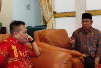 Kepala Kemenag Lingga sedang membahas persiapan MTQ. Foto: INIKEPRI.COM
