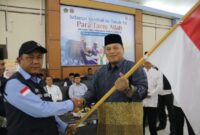 Senyum bahagia dan rasa syukur terpancar dari wajah 445 jemaah haji Kloter BTH 10 asal Kabupaten Indragiri Hulu dan Kuantan Singingi, yang akhirnya tiba kembali di tanah air usai menunaikan rukun Islam kelima di Tanah Suci. Foto: INIKEPRI.COM