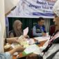 Embarkasi Batam membagikan living cost kepada jamaah. Foto: INIKEPRI.COM