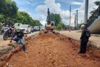 Perbaikan jalan di SP. Foto: INIKEPRI.COM