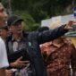 Anggota/Deputi Bidang Infrastruktur Mouris Limanto saat memberikan pengarahan kepada tim dalam tinjauan titik banjir beberapa waktu lalu. Foto: INIKEPRI.COM/BP Batam 