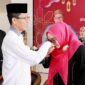 Wali Kota Batam Amsakar Achmad dan istri Erlita Sari, Peringatan Isra Mikraj Nabi Muhammad SAW yang dirangkaikan dengan penyambutan Bulan Suci Ramadan 1447 Hijriah. Foto: INIKEPRI.COM/Media Center Batam 