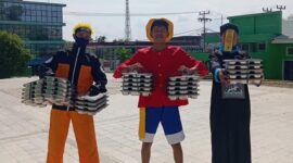 Petugas mengantarkan MBG ke MIN Tanjungpinang. Foto: INIKEPRI.COM