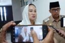 Bupati Natuna Cen Sui Lan dan Wakil Bupati Jarmin seusai Upacara Hardiknas. Foto: Istimewa 
