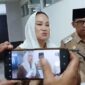 Bupati Natuna Cen Sui Lan dan Wakil Bupati Jarmin seusai Upacara Hardiknas. Foto: Istimewa 