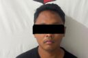 Polisi mengamankan tersangka R dalam kasus penipuan, penggelapan, dan pencurian dengan modus love scam. Foto: Dok. Polsek Batam Kota