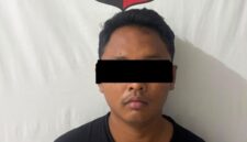 Polisi mengamankan tersangka R dalam kasus penipuan, penggelapan, dan pencurian dengan modus love scam. Foto: Dok. Polsek Batam Kota