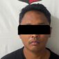 Polisi mengamankan tersangka R dalam kasus penipuan, penggelapan, dan pencurian dengan modus love scam. Foto: Dok. Polsek Batam Kota