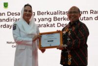 Bupati Natuna, Cen Sui Lan, saat membuka Workshop Pengelolaan Keuangan dan Pembangunan Desa Tahun 2026 di Gedung Serbaguna Sri Serindit. Foto: INIKEPRI.COM